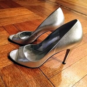 Silver open toe pumps